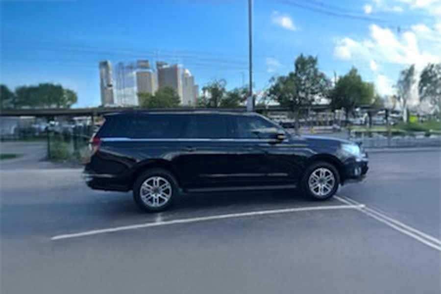 Passengers hailing a taxi.